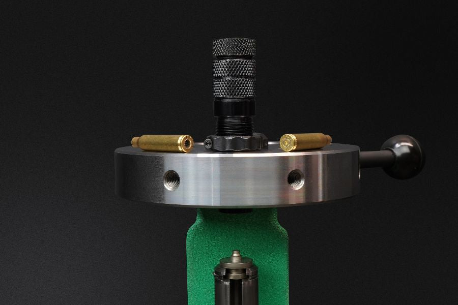 Universal case hold down die on turret press for reloading ammo