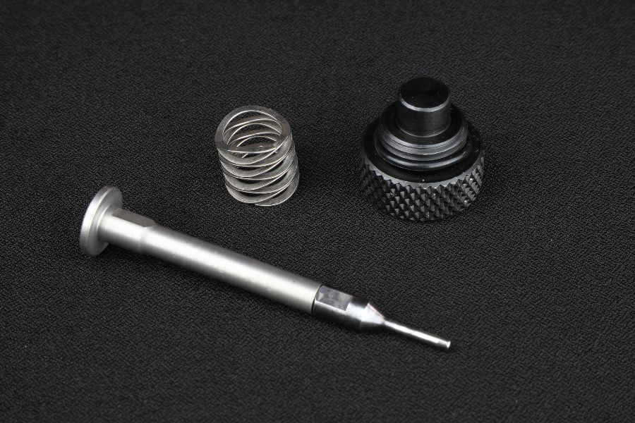 decapping parts and primer flicker spring
